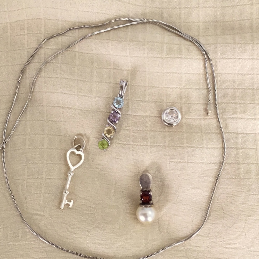 Four sterling pendants with 16 inch sterling chain